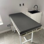 Veterinary table mattress with fittings